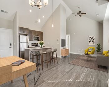 our apartments offer a living room with a kitchen and dining area at 24 at Bloomfield, Bloomfield Township, 48302